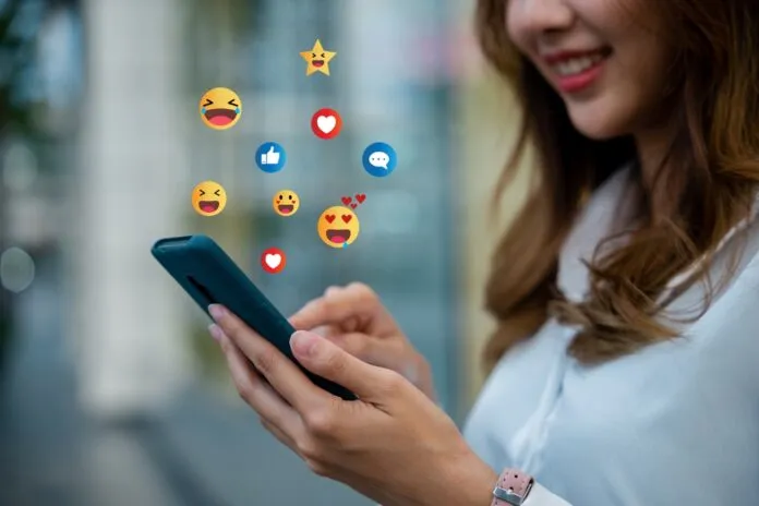 A,Woman,Reading,An,Article,On,Her,Smartphone,While,Enjoying