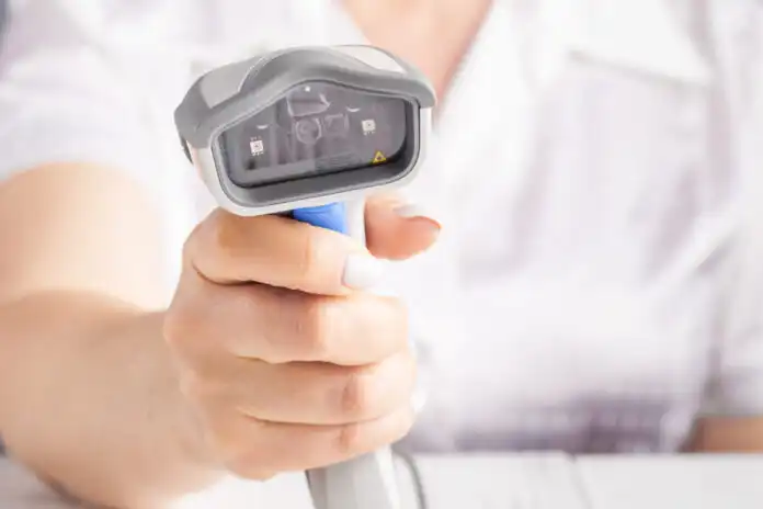 Hand,Holding,Barcode,Scanning.,Selective,Focus