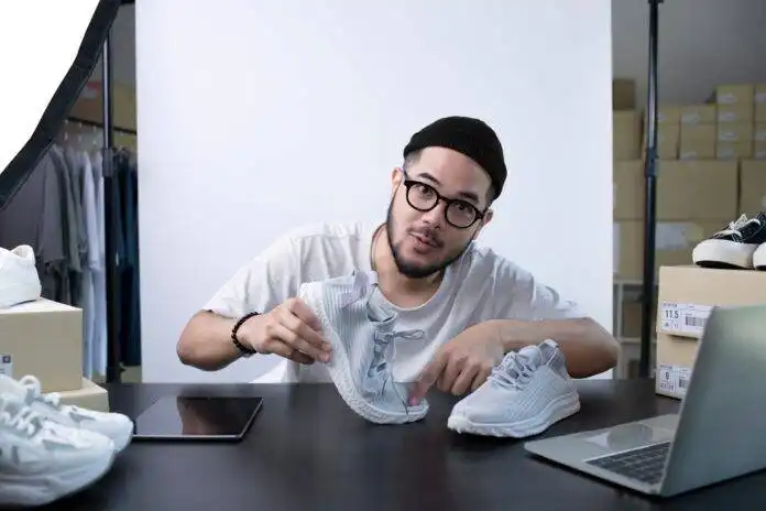 Young,Attractive,Asian,Man,Blogger,Or,Vlogger,Looking,At,Camera