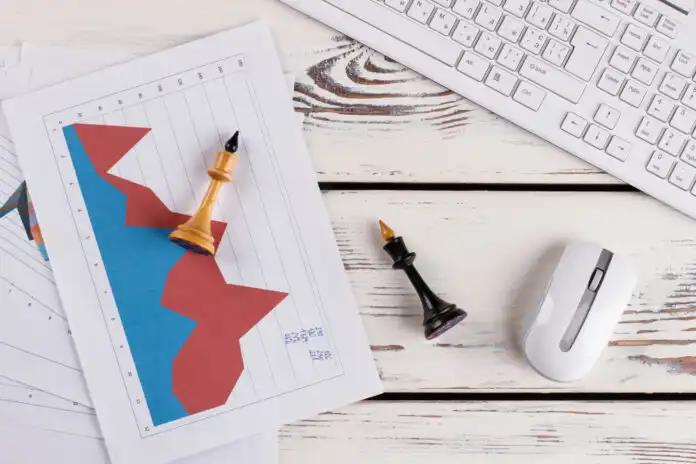 Computer,Peripherals.,Documents,With,Charts,And,Cherss,Figures,On,Wooden